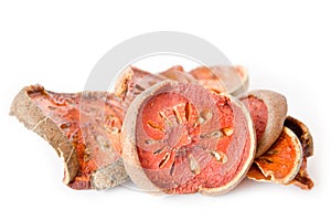 Dry Bael Fruit tea on white background