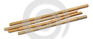 Dry bamboo sticks on white background, top view