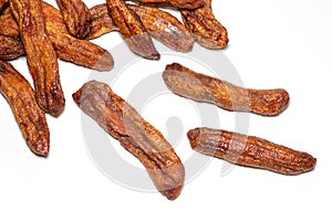 Dry bananas pile against white background