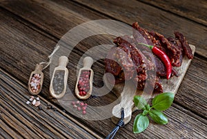 Dry beef meat jerky biltong with hot pepper chilli and spices