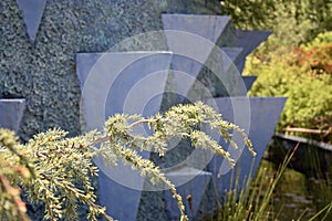 Dry Blue Water Fountain by a reed pond