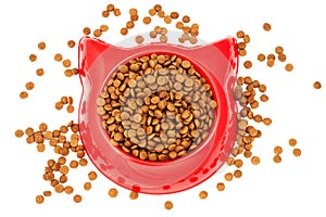 Dry brown pet food for cat in the red plastic bowl