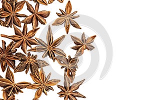 Dry brown star anise fruit isolated on white