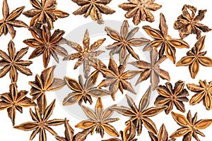 Dry brown star anise fruit isolated on white