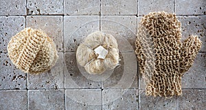 Dry brushing and exfoliation with set of natural loofah sponges