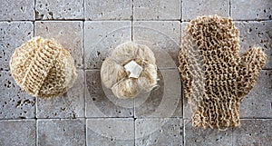 Dry brushing and exfoliation with set of natural loofah sponges photo
