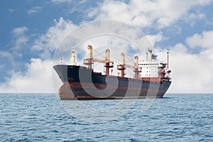 Dry cargo ship floating on the sea