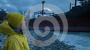 Dry cargo ship ran aground off the coast of the Black Sea. The transport ship is moored at the shore