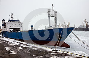 Dry cargo vessel in sea port