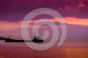 Dry Cargo Vessel On On The Sunset