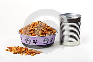 dry cat dog food in granules in cute bowl and wet canned food