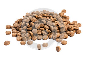 Dry cat food isolated on white background close-up top view