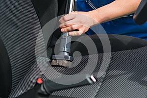 Dry cleaning of car seats by a specialist close-up