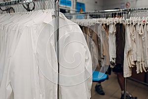 Dry cleaning clothes. Clean cloth chemical process. Laundry industrial dry-cleaning