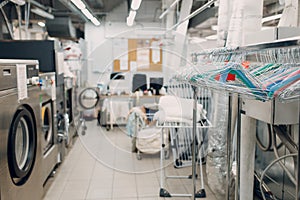 Dry cleaning clothes. Clean cloth chemical process. Laundry industrial dry-cleaning