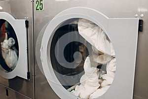 Dry cleaning clothes. Clean cloth chemical process. Laundry industrial dry-cleaning