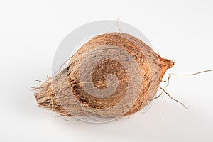 Dry coconut fruit isolated over white background