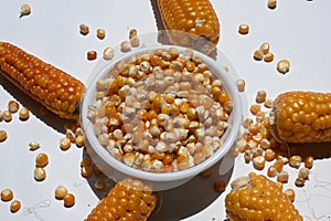 Dry corn seeds in bowl.