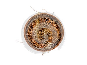 Dry Corn Stigmas in wooden Cup on white background photo