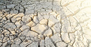 Dry cracked earth close up. Selective focus