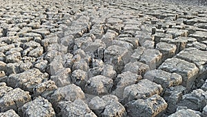 Dry, cracked soil caused by drought.