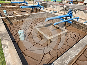 Dry and cracked soil or sediment the treatment pond