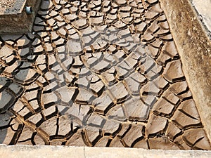 Dry and cracked soil or sediment the treatment pond