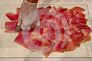 Dry cured ham jamon slices photo