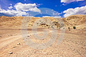Dry desert rocks wasteland scenery landscape in bright summer day time global warming concept nature photography copy space