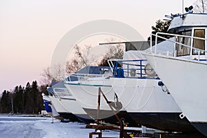 Dry docked boats at the winter harbor photo
