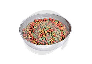 Dry dog food in aluminium bowl isolated on white background