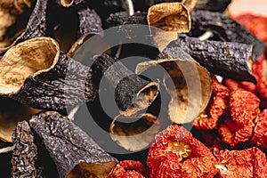 Dry eggplant and dry bell chili hanging in the market, local ingredient, closeup selective focus on blurred background