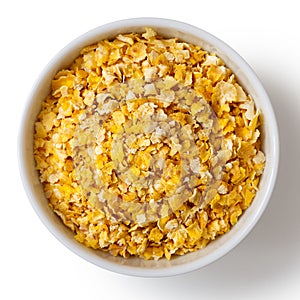 Dry flaked corn in white ceramic bowl.