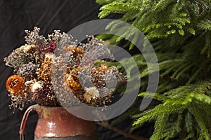 Dry flowers and pine tree