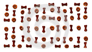 Dry food for animals from figures on white background. Pattern for design. Creative copy space