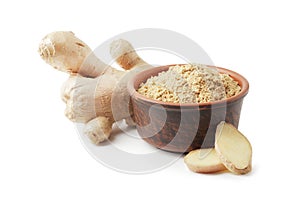 Dry and fresh ginger in bowl isolated on white