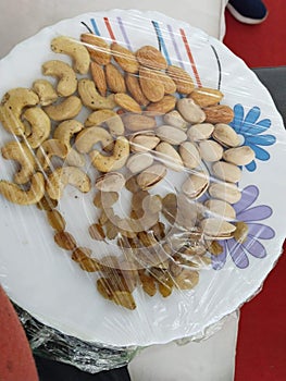 Dry Fruits Plate for Festival Kaju Kismish Badam Pista photo