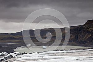 The dry glacial lagoon at SÃ³lheimajÃ¶kul