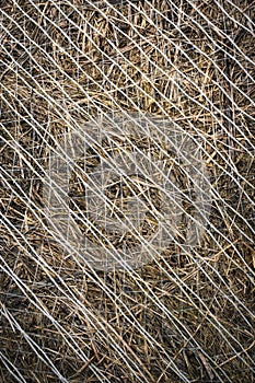 Dry grass wrapped in a white net