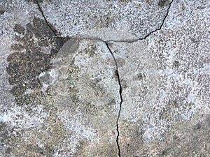 Dry gray cracked asphalt. Abstract minimalistic background.