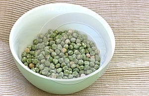 Dry green pea on white background