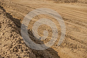 Dry ground destroyed by heavy machinery