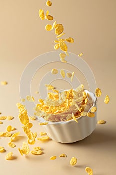 Dry honey cornflakes in a ceramic plate