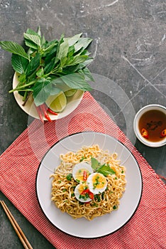 Dry instant noodle - asian ramen and vegetables for the soup