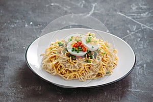 Dry instant noodle - asian ramen and vegetables for the soup