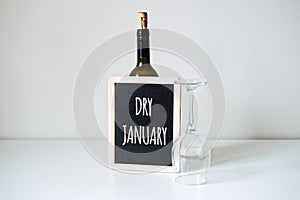 Dry January. Alcohol-free challenge, Health campaign urging people to abstain from alcohol for the January month. Bottle photo