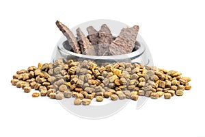 Dry kibble pet food. Dog or cat food isolated on white background