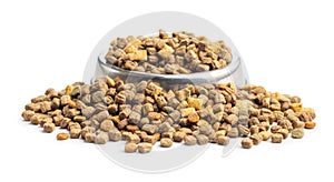 Dry kibble pet food. Dog or cat food isolated on white background
