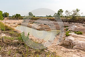 Dry land with broken soil represent hot weather and global warming. Aerial view showing low water level . Climate change and droug