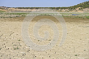 Texture of dry land in southern Europe. Global warming and greenhouse effect photo